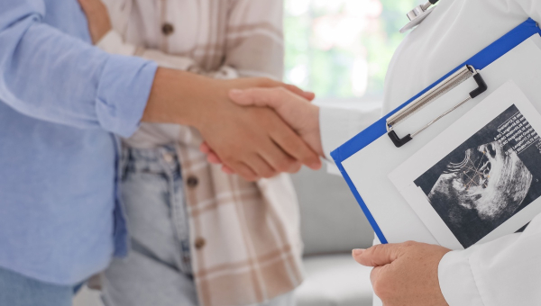 A couple talking to a Kingwood IVF specialist